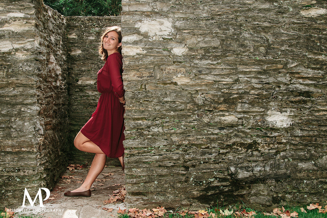 female-fall-outdoor-senior-portraits-jeffrey-mansion-bexley-ohio-stone-wall