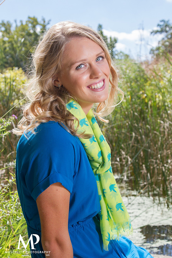 Senior Portraits in front of Pond at Inniswood Metro Gardens.